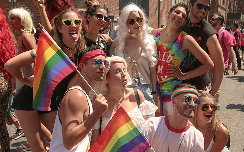 People posing at a free event in NYC